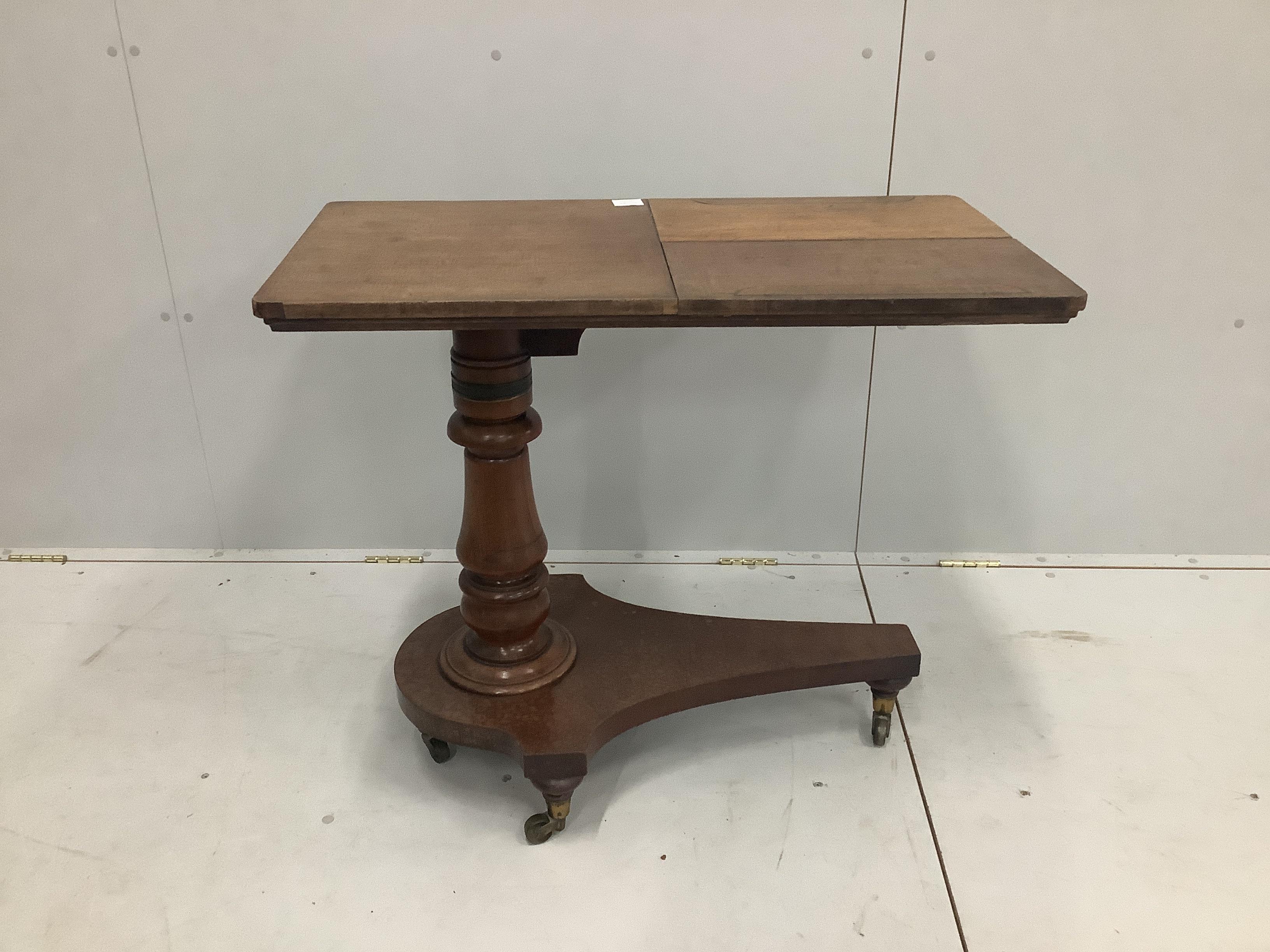 A Victorian adjustable reading table, width 86cm, depth 45cm